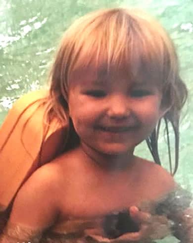 Dove Cameron swimming as a toddler