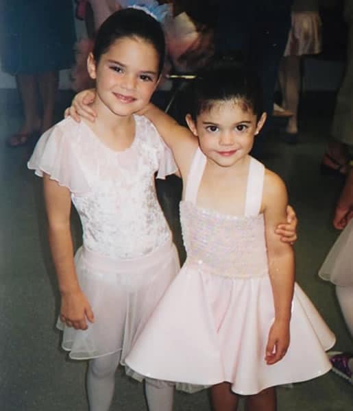 Young Kylie Jenner with her sister, Kendall.