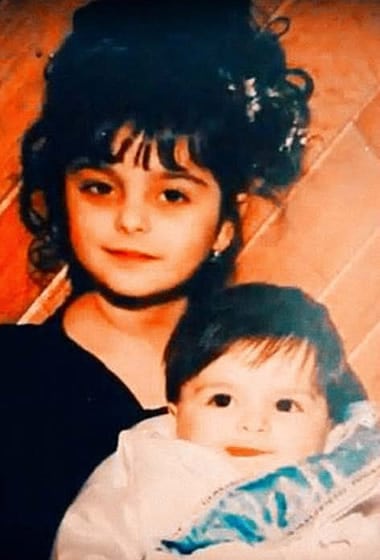 Young Bebe Rexha with her younger brother
